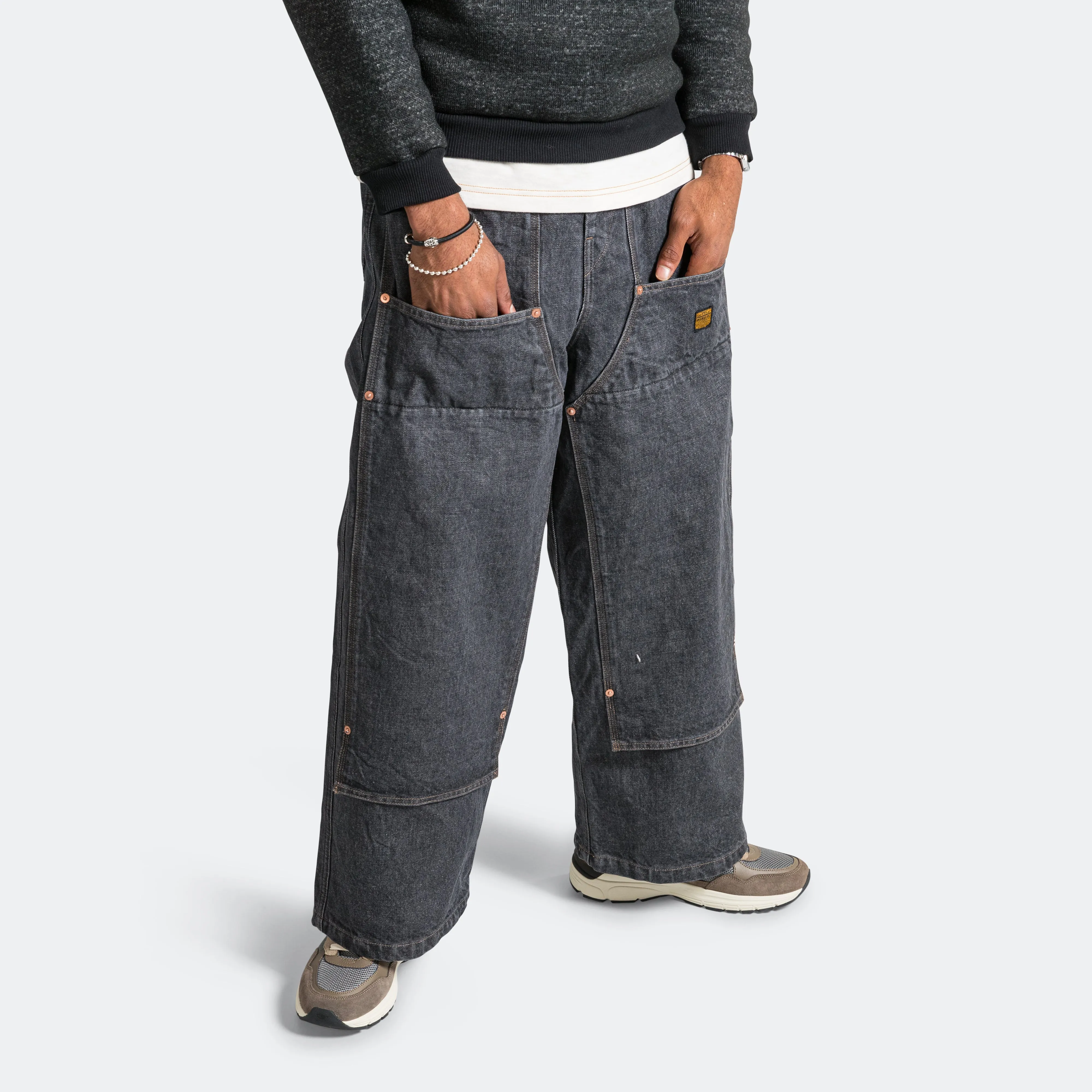 14-ounce black easy pants with knee patches in black denim.