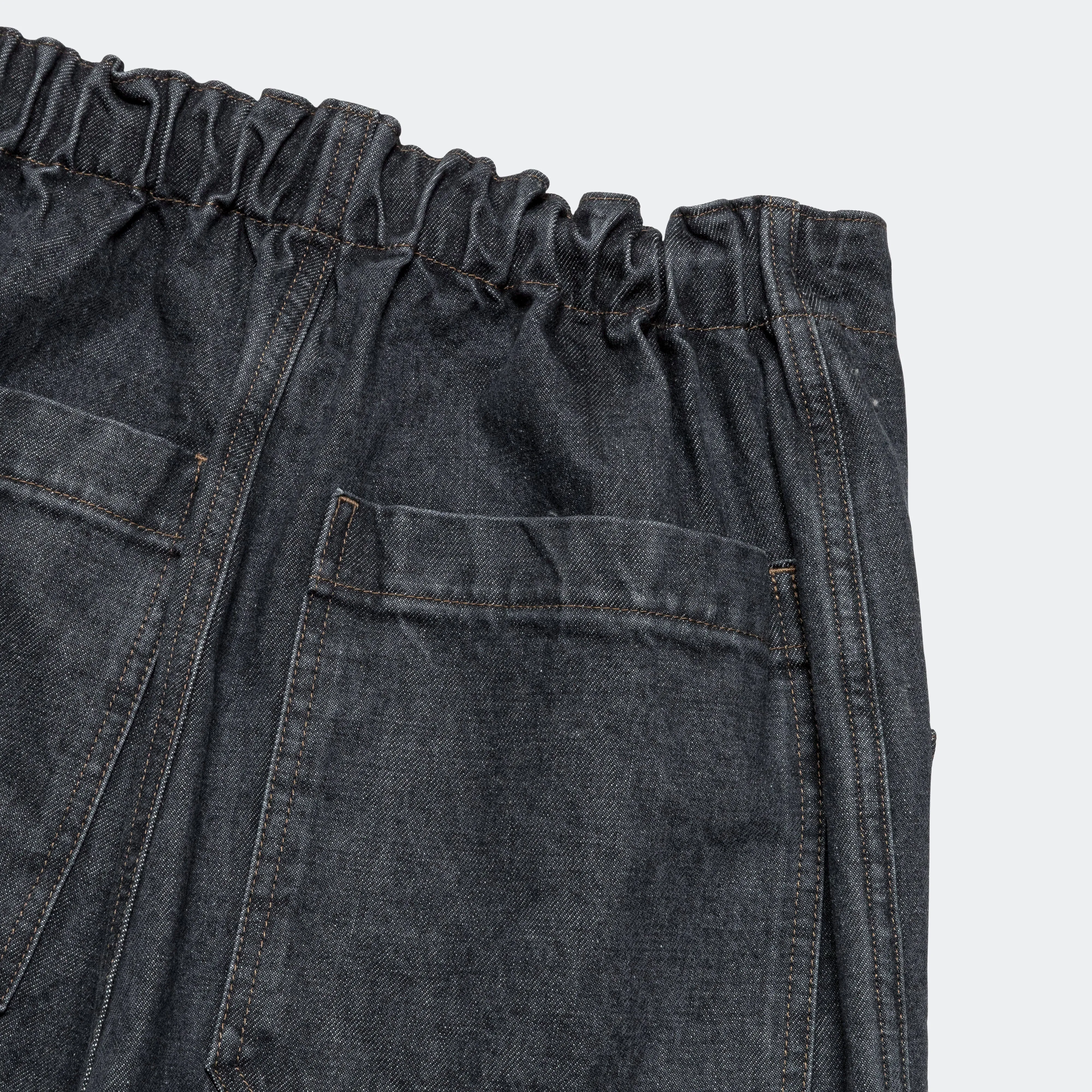 14-ounce black easy pants with knee patches in black denim.