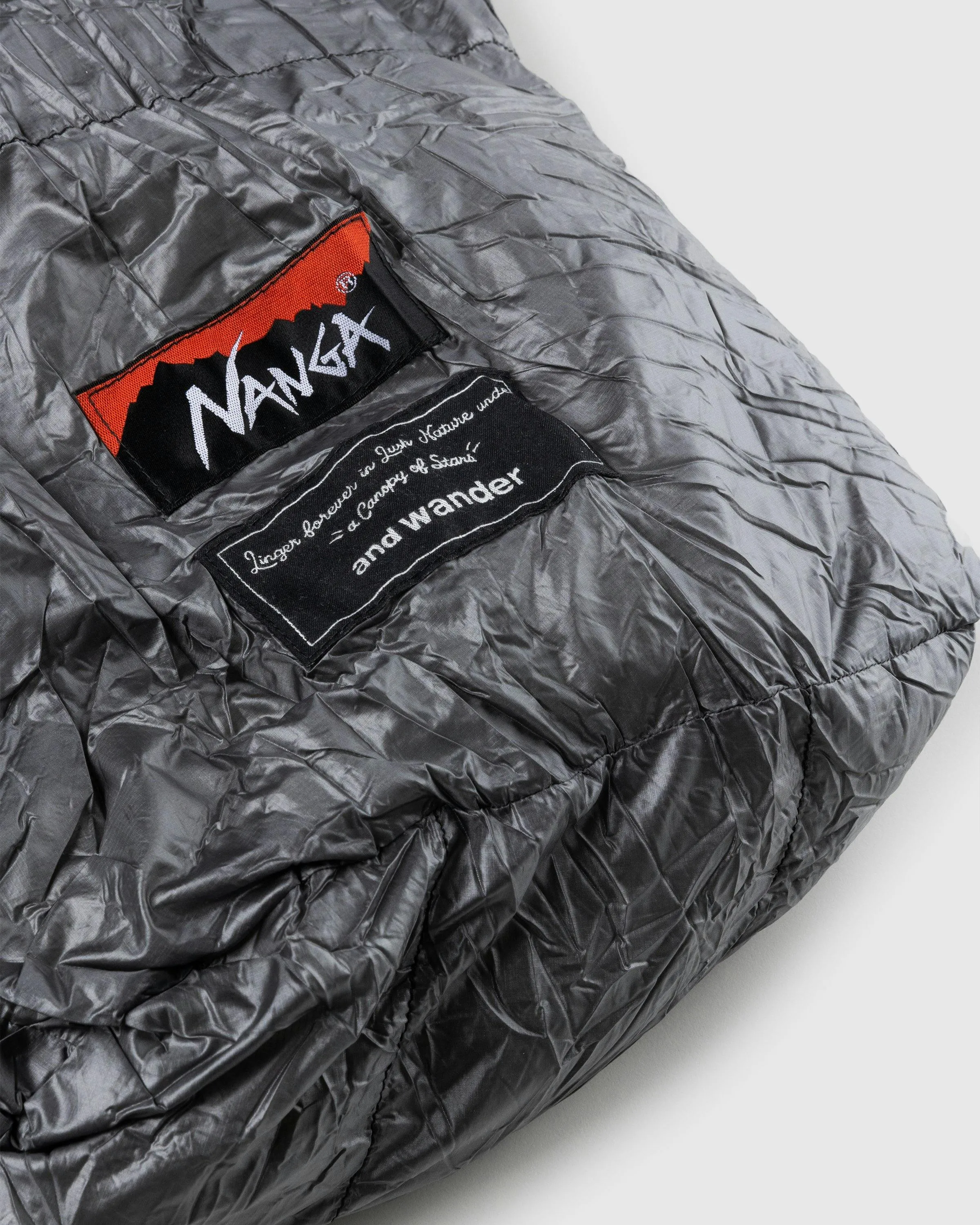 And Wander x Nanga – Down Sleeping Bag Grey | Highsnobiety Shop