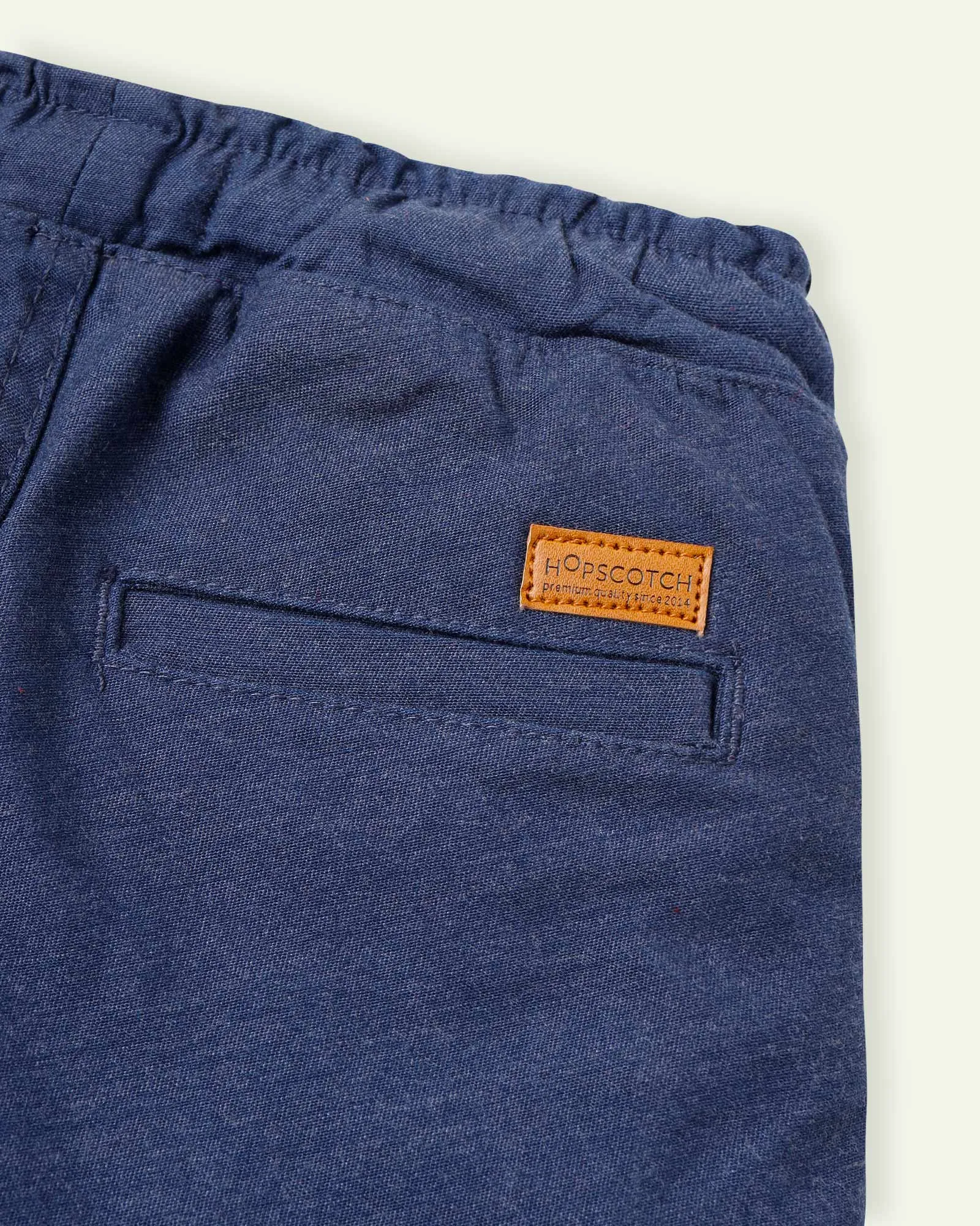 Blue pull up pants with heather finish.