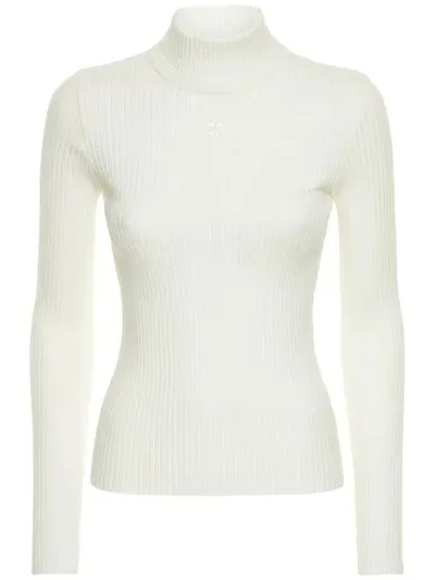 Courreges V-neck and crew neck options.