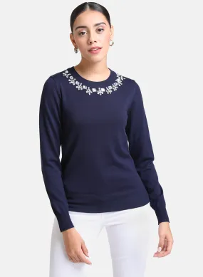 Embellished neck pullover.