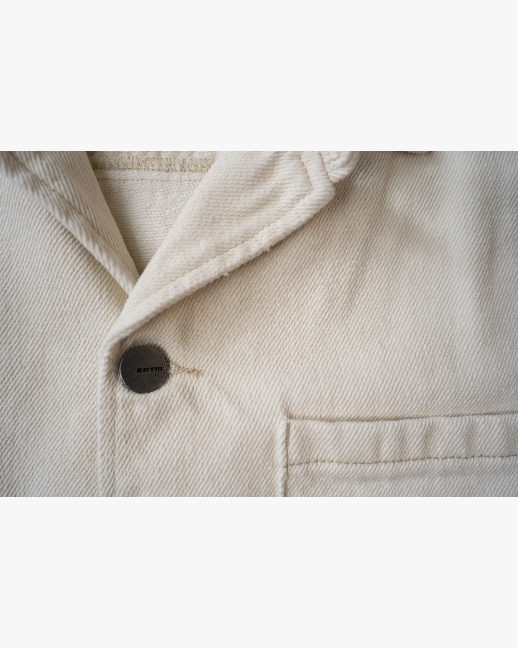 EPTM cream boxy twill shirt.