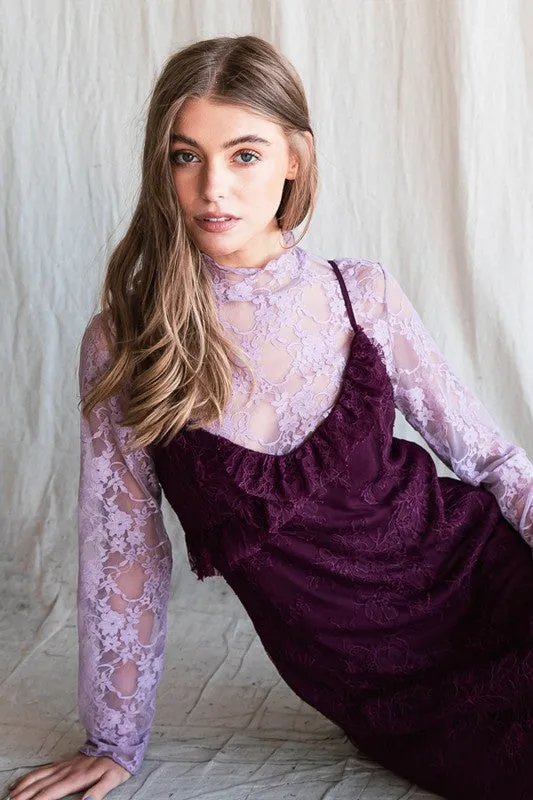 Floral lace top with long sleeves.