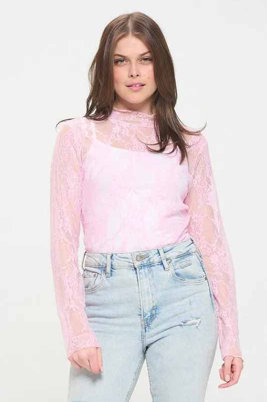 Floral lace top with long sleeves.