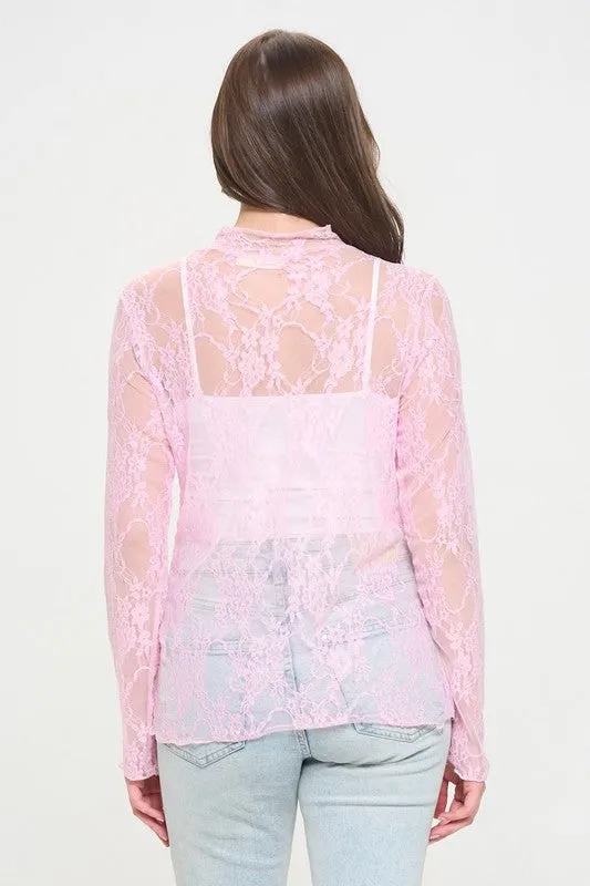 Floral lace top with long sleeves.