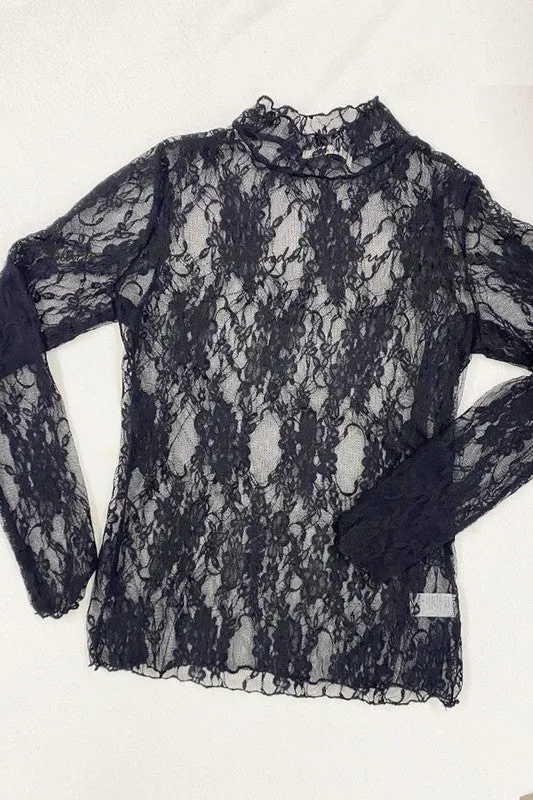 Floral lace top with long sleeves.