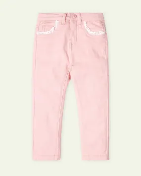 Pink slim fit pants.