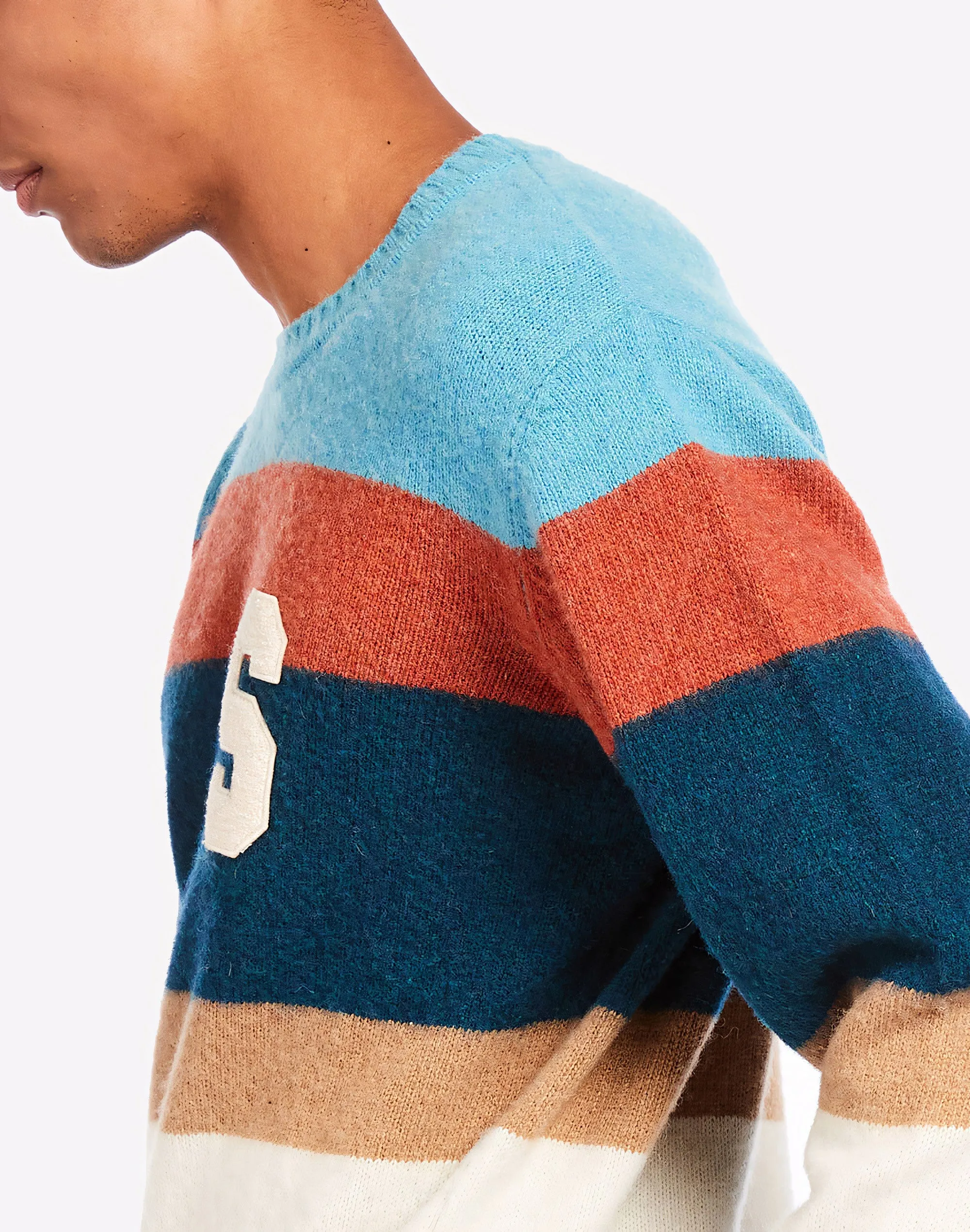 Striped crewneck sweater with patches